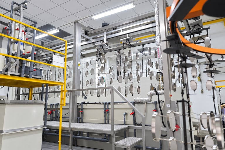 Racked components on the e-coating line